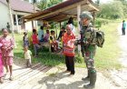 Marinir Satgas Yonif 10 SBY Tebar Berkah di Tanah Papua: Sembako dan Persaudaraan Usai Ibadah Minggu di Kampung Kamat