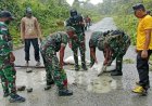 Aksi Nyata Marinir di Pegunungan Papua: Pos Logpon dan Warga Kompak Perbaiki Jalan Poros di Yahukimo