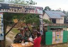 Marinir Yonif 10 SBY Hangatkan Warga Ayata Lewat Berbagi Makan