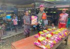 Marinir Berbagi Kasih di Aimasa: Jumat Berkah Hangatkan Warga