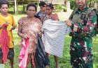 Senyum di Ayata: Marinir Bagikan Baju Layak Pakai di Perbatasan