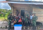 Satgas Yonif 300/Brajawijaya Tebar Kemanusiaan di Kenyam
