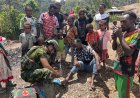 Satgas Yonif 113 Jemput Bola Kesehatan Warga Pedalaman Papua