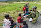 Satgas Yonif 142/KJ Hadirkan Gizi untuk Generasi Papua di Sinak