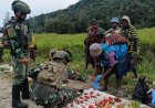 Borong Hasil Tani, Yonif 4 Marinir Perkuat Ekonomi Petani Papua