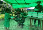 Banau Berbagi Jumat: Satgas Yonif 732 Hadirkan Gizi dan Kebersamaan di Jampul