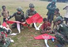 Layang-Layang Merah Putih Warnai Langit Wano Barat, Satgas Yonif 408/Sbh Tanamkan Semangat Persatuan